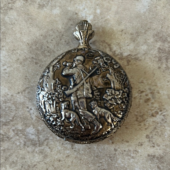Vintage Silver Tone Hunter Pendant